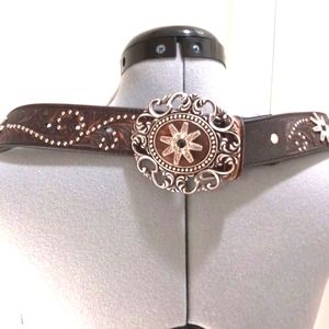 Nooons"s Belt Co 34" to 39" adjustable holes.  Rhinestones & Studded belt
